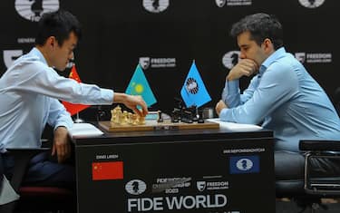 epa10599674 Ian Nepomniachtchi (R) of Russia attends a tie-break game with Ding Liren of China during the FIDE Chess World Championship 2023 in Astana, Kazakhstan, 30 April 2023. Ian Nepomniachtchi of Russia and Ding Liren of China are competing for the world title.  EPA/RADMIR FAHRUTDINOV