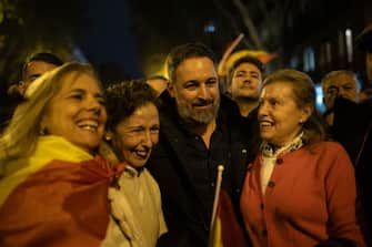 MADRID, SPAIN - NOVEMBER 09: VOX leader Santiago Abascal takes a photo with three women during a protest in Ferraz street, on November 9, 2023, in Madrid, Spain. Hundreds of people have gathered again in Ferraz in the sixth night of protests after the pact between PSOE and Junts that took place today in Brussels to invest the acting Prime Minister and socialist candidate for re-election, Pedro Sanchez. The pact includes a possible amnesty law and cases of 'lawfare', a term with which pro-independence leaders refer to what they consider a persecution by judges and magistrates for political reasons. (Photo By Alejandro Martinez Velez/Europa Press via Getty Images)