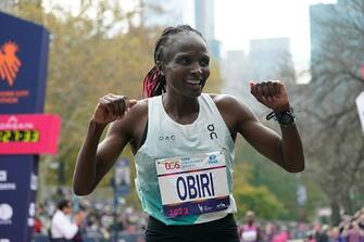 TOPSHOT - Kenya's Hellen Obiri celebrates winning the 52nd Edition of the New York City Marathon on November 5, 2023. (Photo by TIMOTHY A. CLARY / AFP) / ALTERNATE CROP (Photo by TIMOTHY A. CLARY/AFP via Getty Images)