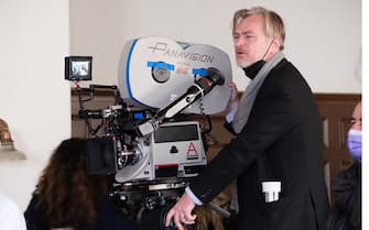 Writer, director, and producer Christopher Nolan on the set of OPPENHEIMER.