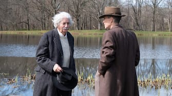L to R: Tom Conti is Albert Einstein and Cillian Murphy is J. Robert Oppenheimer in OPPENHEIMER, written, produced, and directed by Christopher Nolan.