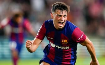 epa10810941 Barcelona's Pedri celebrates after scoring the opening goal during the LaLiga soccer match played at Olympic Stadium in Barcelona, Catalonia, northeast Spain, 20 August 2023.  EPA/Alejandro Garcia