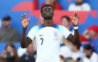 epa10700830 Bukayo Saka of England celebrates after scoring a goal during the UEFA EURO 2024 qualification match between England and North Macedonia in Manchester, Britain, 19 June 2023.  EPA/ADAM VAUGHAN