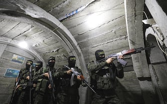 GAZA CITY, GAZA - MARCH 30: Members of Al-Quds Brigades, an armed wing of Islamic Jihad Movement, keep guard at tunnels on Gaza-Israeli border against a possible attack by Israeli forces in Gaza City, Gaza on March 30, 2023. (Photo by Ashraf Amra/Anadolu Agency via Getty Images)