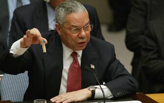 US Secretary of State Colin Powell holds up a vial that he said was the size that could be used to hold anthrax as he addresses the United Nations Security Council 05 February, 2003 at the UN in New York.  Powell urged the UN Security Council to say "enough" to what he said was Iraq's 12 years of defiance of international attempts to destroy its chemical and biological weapons. AFP PHOTO/Timothy A. CLARY (Photo by Timothy A. CLARY / AFP) (Photo by TIMOTHY A. CLARY/AFP via Getty Images)