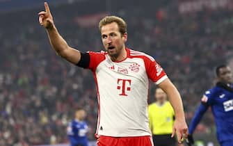 epa11072485 Munich's Harry Kane reacts during the German Bundesliga soccer match between FC Bayern Munich and Hoffenheim in Munich, Germany, 12 January 2024.  EPA/ANNA SZILAGYI CONDITIONS - ATTENTION: The DFL regulations prohibit any use of photographs as image sequences and/or quasi-video.