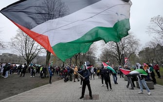 Mandatory Credit: Photo by Canadian Press/Shutterstock (14459854h)
Pro-Palestinian activists wave flags on the outskirts of a protest encampment on the grounds of McGill University, in Montreal, Thursday, May 2, 2024.
Legault-Camp-Mcgill, Montreal, Canada - 02 May 2024