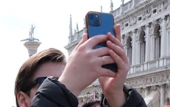 Tourists in St. Mark's Square in Venice, Italy, April 2, 2023.