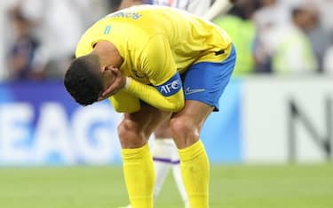 epa11198998 Cristiano Ronaldo of Al-Nassr reacts after missing a goal opportunity during the first leg quarter final of Asian Champions League between Al Ain and Al-Nassr in Al Ain, United Arab Emirates, 04 March 2024.  EPA/ALI HAIDER