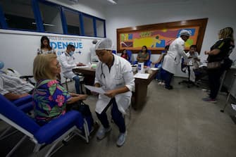 Patients receive medical care inside a health service dedicated to treating patients with dengue symptoms at the Municipal Hospital Raphael de Paula Souza in Rio de Janeiro, Brazil, on February 5, 2024. (Photo by MAURO PIMENTEL / AFP) (Photo by MAURO PIMENTEL/AFP via Getty Images)
