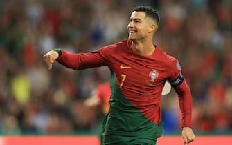 epa10917797 Portugal's Cristiano Ronaldo celebrates after scoring the 2-0 goal from the penalty spot during the UEFA EURO 2024 group J qualifying soccer match between Portugal and Slovakia, in Porto, Portugal, 13 October 2023.  EPA/JOSE COELHO
