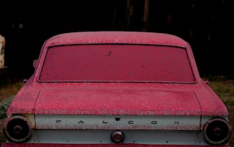SANTA CLARITA, CA - JULY 24, 2016: Several buildings and cars including this Falcon,  were drenched in Phos-Chek, a pink fire retardant, at the Sable Ranch was burned in the Sand Fire, off of Sand Canyon Rd, in Santa Clarita, CA July 24, 2016. The ranch is used varies movie and TV productions. Several of the sets were destroyed in the fire. (Francine Orr/ Los Angeles Times)