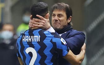 Inter's coach Antonio Conte and Achraf Hakimi during the Italian Serie A soccer match Parma Calcio vs FC Inter at Ennio Tardini stadium in Parma, Italy, 04 March 2021. ANSA / SERENA CAMPANINI