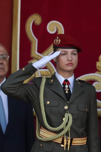 (FILES) Spanish Crown Princess of Asturias Leonor attends the Spanish National Day military parade in Madrid on October 12, 2023. Princess Leonor, the heiress to the Spanish crown, will swear loyalty to the constitution on October 31 on her 18th birthday, helping to turn the page on the scandal-tainted reign of her grandfather, Juan Carlos. After taking the oath Princess Leonor can legally succeed her father, King Felipe VI, and automatically becomes head of state in the event of the monarch's absence. (Photo by Pierre-Philippe MARCOU / AFP)