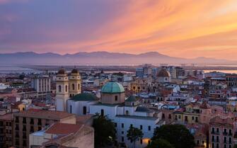 "Waterfront cityscape at sunset, Cagliari, Provincia di Cagliari, Italy, "