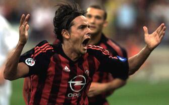 ROM05 - 20020814 - MILAN, ITALY : Milan soccer team player Filippo Inzaghi (C) cheers after scoring against Slovakian Slovan Liberec team during their Champions League soccer match in Milan on Wednesday, 14 August 2002. The match ended 1-0.
EPA PHOTO ANSA/DAL ZENNARO/JI-ms
