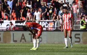 epa10586228 Almeria's Chumi (R) and Samu Costa (L) during the Spanish LaLiga soccer match between UD Almeria and Athletic Club de Bilbao in Almeria, Spain, 22 April 2023.  EPA/Carlos Barba