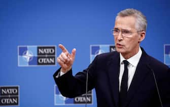 Secretary General of NATO Jens Stoltenberg gestures during a press conference at the end of a virtual meeting of the NATO-Ukraine Council (NUC) at the NATO headquarters in Brussels, on April 19, 2024. (Photo by Kenzo TRIBOUILLARD / AFP)