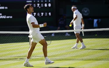 epa12206677 Carlos Alcaraz of Spain gestures during the Men's 1st round match against Fabio Fognini of Italy at the Wimbledon Championships, Wimbledon, Britain, 30 June 2025.  EPA/TOLGA AKMEN  EDITORIAL USE ONLY EDITORIAL USE ONLY