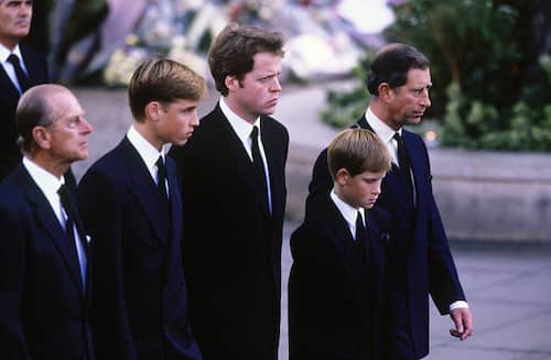 LONDON - SEPTEMBER 6:   Princess Diana's Family members, Prince Philip, Duke of Edinburgh, Prince William, the 9th Earl Charles Spencer, Prince Harry, and Prince Charles, walk behind the funeral cortege, at the funeral of Diana, Princess of Wales on September 6, 1997 at Westminster Abbey, London, England.(Photo by David Levenson/Getty Images)