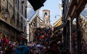 Crowded streets of Venice during Carnival.