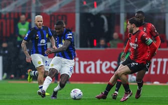 Marcus Thuram of FC Internazionale scores a goal during Serie A 2023/24 football match between AC Milan and FC Internazionale at San Siro Stadium, Milan, Italy on April 22, 2024