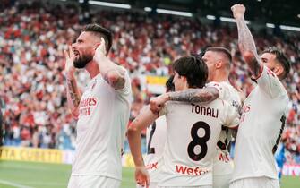 Milan's   Olivier Giroud    jubilates with his teammates after scoring the second goal during the Italian Serie A soccer match US Sassuolo vs AC Milan  at Mapei Stadium in Reggio Emilia, Italy, 22 May 2022. ANSA /SERENA CAMPANINI
