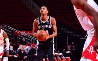 HOUSTON, TX - DECEMBER 15:   Devin Vassell #24 of the San Antonio Spurs shoots a free throw on December 15, 2020 at the Toyota Center in Houston, Texas. NOTE TO USER: User expressly acknowledges and agrees that, by downloading and or using this photograph, User is consenting to the terms and conditions of the Getty Images License Agreement. Mandatory Copyright Notice: Copyright 2020 NBAE (Photo by Cato Cataldo/NBAE via Getty Images)