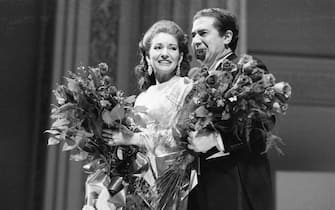 (Original Caption) 3/5/1974-New York, NY- Soprano Maria Callas poses on stage after a concert in New York's Carnegie Hall. Singing a program of Italian and French operatic solos and duets with tenor Giuseppe di Stefano, who is on stage with her, Miss Callas made her first appearance in New York in almost ten years. One New York critic said that it "would be silly to pretend that Miss Callas has much voice left," but added, "she remains an artist...."