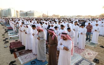 epa11998401 Muslims attend the Eid Al-Fitr prayer at Al Barsha Eid Musalla in Dubai, United Arab Emirates, 30 March 2025. This year, the Muslim world split into two groups for Eid al-Fitr celebrations, with some countries observing it on March 30 and others on March 31, 2025. Eid al-Fitr marks the end of Ramadan, a holy fasting month, and is one of Islam s two major holidays. During the festival, people visit family and friends, and children receive new clothes and money.  EPA/ALI HAIDER