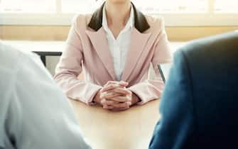 beautiful woman and her job interview in office (work).