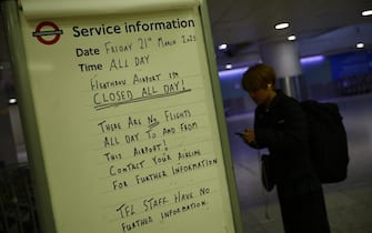 epa11977926 A service information notice in the Underground Station at Terminal 5 at Heathrow Airport in Hillingdon, London, Britain, 21 March 2025. The Heathrow Airport on 21 March announced it would be closed all day, following a power outage 'due to a fire at an electrical substation supplying the airport'.  EPA/TOLGA AKMEN
