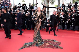 CANNES, FRANCE - MAY 19: Natasha Poly attends the "Horizon: An American Saga" Red Carpet at the 77th annual Cannes Film Festival at Palais des Festivals on May 19, 2024 in Cannes, France. (Photo by Daniele Venturelli/WireImage)