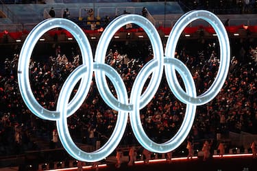 epa09727589 The Olympic rings are seen during the Opening Ceremony for the Beijing 2022 Olympic Games at the National Stadium, also known as Bird's Nest, in Beijing China, 04 February 2022.  EPA/FAZRY ISMAIL