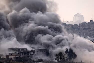 This picture taken on November 12, 2023 from a position along the border with the Gaza Strip in southern Israel shows a smoke plume erupting during Israeli bombardment on the Palestinian enclave amid ongoing battles. More than 10,000 people have been killed in relentless Israeli bombardment of the Gaza Strip, according to the Hamas-run health ministry, since the war erupted after Palestinian militants raided southern Israel on October 7 killing at least 1200 people, according to official Israeli figures. (Photo by FADEL SENNA / AFP)