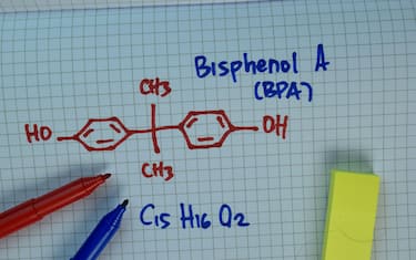 Bisphenol A (BPA) write on a book. Structural chemical formula. Education concept