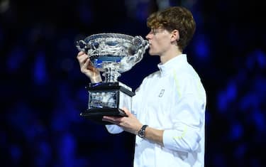 epa11854384 Jannik Sinner of Italy poses with the Norman Brookes Challenge Cup trophy after winning the Men's Singles final match against Alexander Zverev of Germany at the Australian Open Grand Slam tennis tournament in Melbourne, Australia, 26 January 2025.  EPA/JOEL CARRETT  AUSTRALIA AND NEW ZEALAND OUT