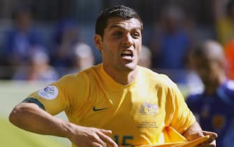 Kaiserslautern, GERMANY:  Australian forward John Aloisi celebrates his goal against Japan in their first round Group F World Cup football match at Kaiserslautern's Fritz-Walter Stadium, 12 June 2006. Aloisi scored the team's third goal as Australia came from behind to win the match 3-1.            AFP PHOTO / TORSTEN BLACKWOOD  (Photo credit should read TORSTEN BLACKWOOD/AFP via Getty Images)