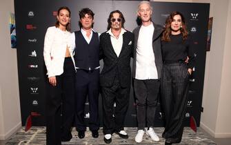 ROME, ITALY - OCTOBER 26: (L-R) Antonia Desplat, Riccardo Scamarcio, Johnny Depp, Bruno Gouery and Luisa Ranieri attend the "Modì – Three Days On The Wing Of Madness" luncheon during the 19th Rome Film Festival at Soho House Rome on October 26, 2024 in Rome, Italy. (Photo by Daniele Venturelli/Getty Images)