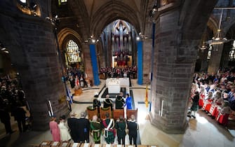 (C, L-R) Britain's Queen Camilla, Britain's King Charles III, Britain's Prince William, Prince of Wales, and Britain's Catherine, Princess of Wales, attend a National Service of Thanksgiving and Dedication inside St Giles' Cathedral in Edinburgh on July 5, 2023. Scotland on Wednesday marked the Coronation of King Charles III and Queen Camilla during a National Service of Thanksgiving and Dedication where the The King was presented with the Honours of Scotland. (Photo by Peter Byrne / POOL / AFP) (Photo by PETER BYRNE/POOL/AFP via Getty Images)