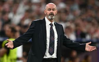 Scotland's head coach Steve Clarke gestures during the UEFA Euro 2024 Group A football match between Germany and Scotland at the Munich Football Arena in Munich on June 14, 2024. (Photo by Fabrice COFFRINI / AFP)
