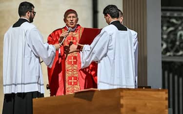 Italian cardinal Giovanni Battista Re officiates the mass in front of the coffin of late Pope Francis, during the funeral ceremony at St Peter's Square at the Vatican on April 26, 2025. (Photo by Alberto PIZZOLI / AFP) (Photo by ALBERTO PIZZOLI/AFP via Getty Images)          