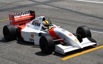 AUTODROMO INTERNAZIONALE ENZO E DINO FERRARI, ITALY - MAY 19: Sebastian Vettel drives Ayrton Senna's McLaren MP4/8 during the Emilia Romagna GP at Autodromo Internazionale Enzo e Dino Ferrari on Sunday May 19, 2024 in imola, Italy. (Photo by Mark Sutton / Sutton Images)