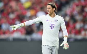 SINGAPORE, SINGAPORE - AUGUST 2: Yann Sommer of FC Bayern Munchen gestures during the pre-season friendly match between Liverpool and Bayern Muenchen at the National Stadium on August 2, 2023 in Singapore. (Photo by Apinya Rittipo/Getty Images)