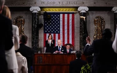 US President Joe Biden, center, during a State of the Union address at the US Capitol in Washington, DC, US, on Thursday, March 7, 2024. Election-year politics will increase the focus on Biden's remarks and lawmakers' reactions, as he's stumping to the nation just months before voters will decide control of the House, Senate, and White House. Photographer: Shawn Thew/EPA/Bloomberg via Getty Images