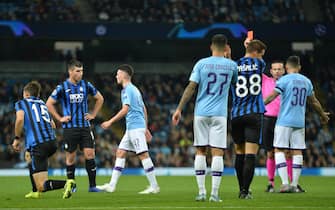 epa07941704 Manchester City's Phil Foden receives a red card during the UEFA Champions League Group C match between Manchester City and Atalanta in Manchester, Britain, 22 October 2019.  EPA/PETER POWELL .
