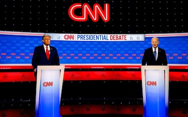 US President Joe Biden, right, and former US President Donald Trump during the first presidential debate in Atlanta, Georgia, US, on Thursday, June 27, 2024. Biden and Trump are facing off for their first 2024 debate, a high-stakes opportunity to break through to politics-weary Americans and one that holds the potential for disastrous missteps. Photographer: Eva Marie Uzcategui/Bloomberg via Getty Images
