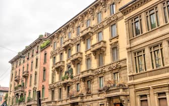 Milan, Italy - July 12, 2022: Residential building facades on the streets of Milan