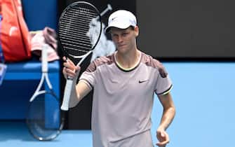 epa11075156 Jannik Sinner of Italy reacts after winning his first round match against Botic van de Zandschulp of the Netherlands on Day 1 of the 2024 Australian Open at Melbourne Park in Melbourne, Australia, 14 January 2024.  EPA/LUKAS COCH AUSTRALIA AND NEW ZEALAND OUT