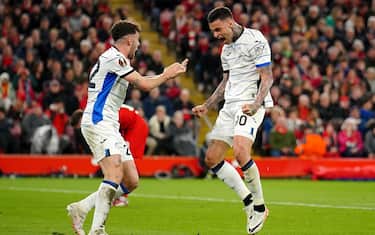 Atalanta's Gianluca Scamacca (right) celebrates with Matteo Ruggeri after scoring their first goal of the game during the UEFA Europa League quarter-final, first leg match at Anfield, Liverpool. Picture date: Thursday April 11, 2024.